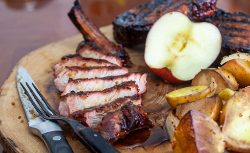 Apple Smoked Pork Chops on a Charcoal Grill